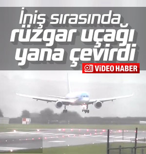 İngiltere'de iniş sırasında yan dönen uçak