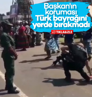 Başkan Erdoğan'ın koruması bayrağı yerde bırakmadı