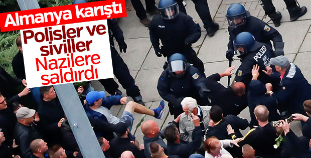Almanya'da polisler göçmen karşıtlarına saldırdı