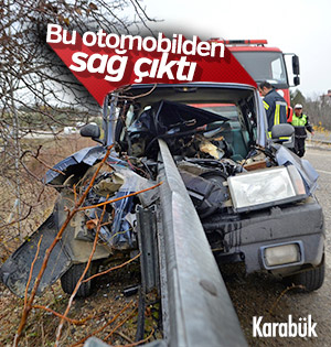 Bariyere saplanan otomobilden sağ çıktı