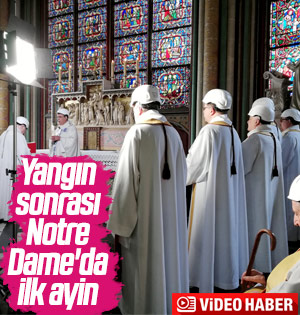 Notre Dame'da beyaz baretli ayin