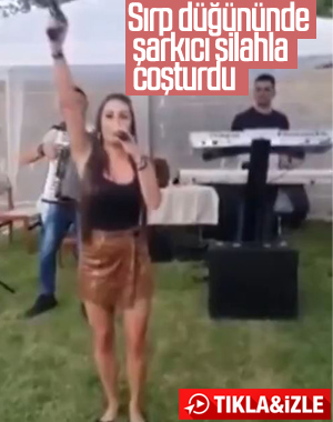 Sırbistan'da şarkı söylerken havaya ateş etti