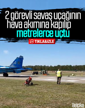Belçika'da savaş uçağının hava akımıyla 2 kişi savruldu