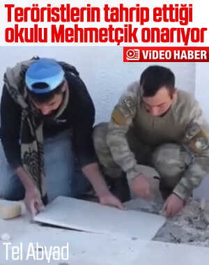 Teröristlerin tahrip ettiği okulu Mehmetçik onarıyor