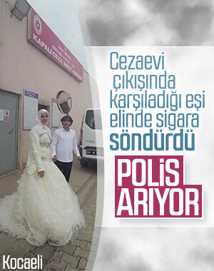 Cezaevi çıkışında karşıladığı eşi elinde sigara söndürdü