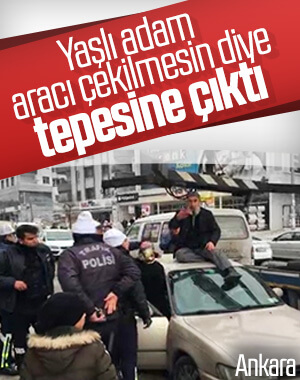 Ankara'da yaşlı adam otomobilinin üzerine çıktı