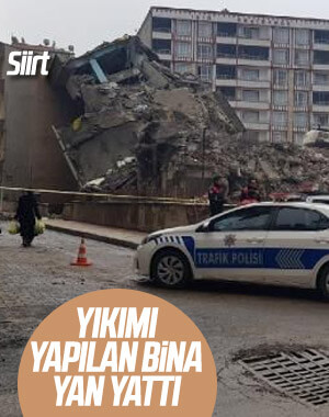Siirt'te yıkılan bina yan yattı