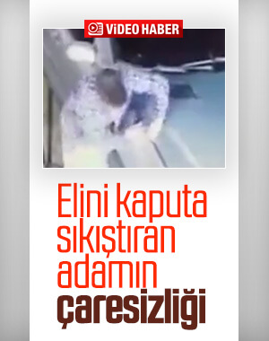 Elini kaputa sıkıştıran adamın zor anları