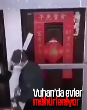 Çin'de koronavirüs nedeniyle evlerin mühürlendiği iddiası