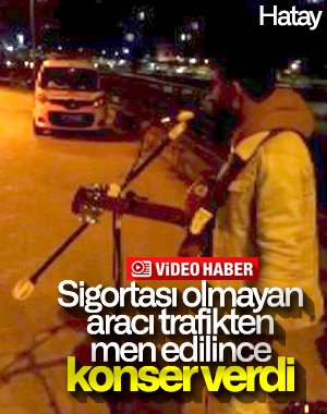 Hatay'da otomobili bağlanan müzisyenden mini konser