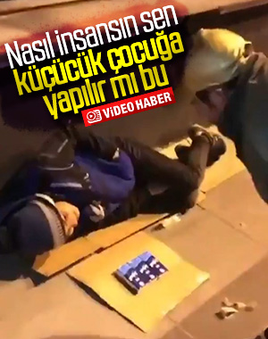 Yerde yatan Suriyeli çocukla dalga geçti
