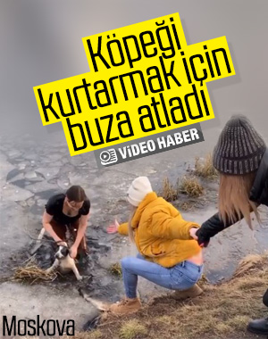 Rus kadın buzları kırarak köpeği kurtardı