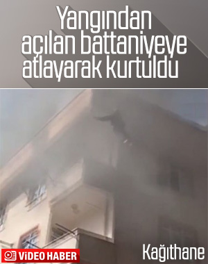 Yangından açılan battaniyeye atlayarak kurtuldu