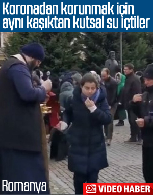 Romanyalılar koronaya karşı aynı kaşıktan kutsal su içti
