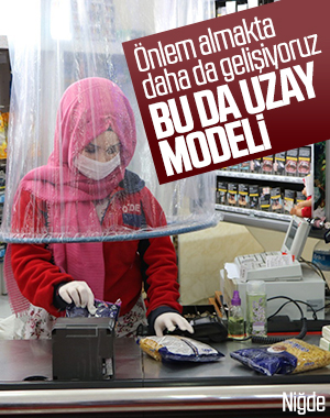 Niğde'de markette poşetli koronavirüs önlemi
