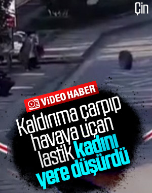 Çin'de, minibüsün kopan lastiği kadına çarptı