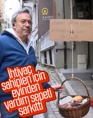 Fatih'te evinden yardım sepeti sarkıtan İngiliz