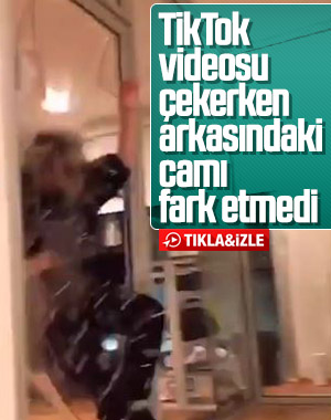 TikTok videosu çekerken cam kapıyı kırdı