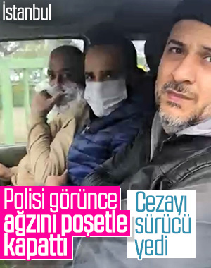 Maskesiz şahıs, polisi görünce yüzünü poşetle kapattı