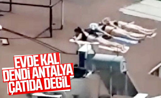 Sahile inemeyen Antalyalı kadınlar çatıda güneşlendi