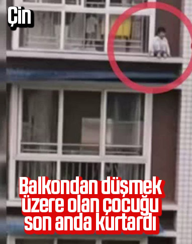 Çin’de 5 yaşındaki çocuk, düşmek üzereyken kurtarıldı