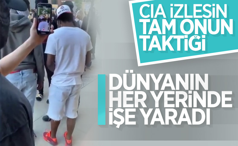 ABD'deki gösteri sırasında para veriliyor iddiası