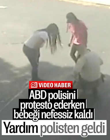 ABD’de eylemdeki kadının bebeğini, polis kurtardı