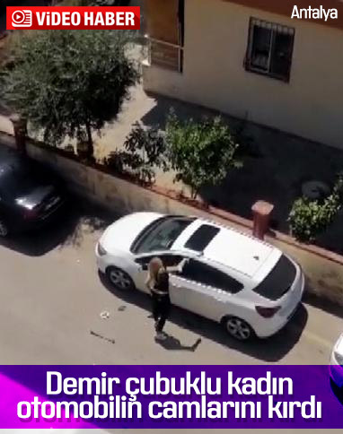 Antalya'da park halindeki aracın camlarını kıran kadın