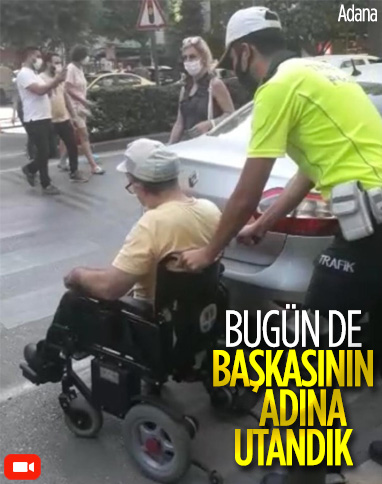 Adana'da yaya geçidine park edilen araç engelli vatandaşa engel oldu