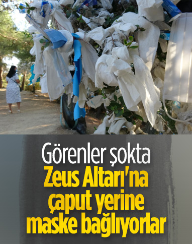 Zeus Altarı'nda dilek ağaçlarını maske atıkları ile doldurdular