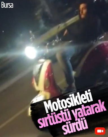 Bursa'da motosikleti sırtüstü yatarak kullanan sürücü