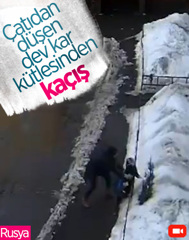 Rusya'da anne çocuğunu düşen kar kütlesinden son anda kurtardı