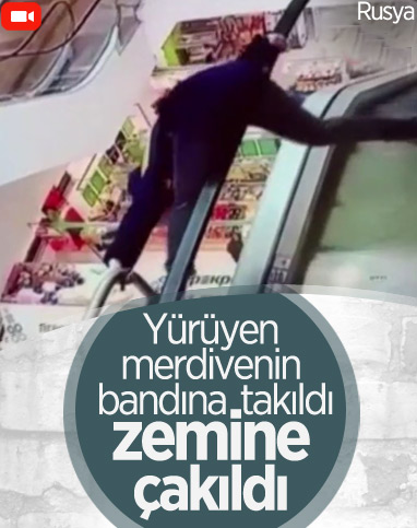 Rusya’da yürüyen merdivenin bandına takılıp düştü