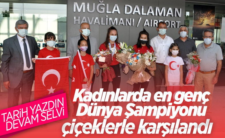 Dünya şampiyonu güreşçi Selvi İlyasoğlu, memleketi Muğla'da çiçeklerle karşılandı