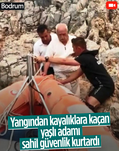Bodrum'da yangından kaçan yaşlı adam, kayalıklara sığındı