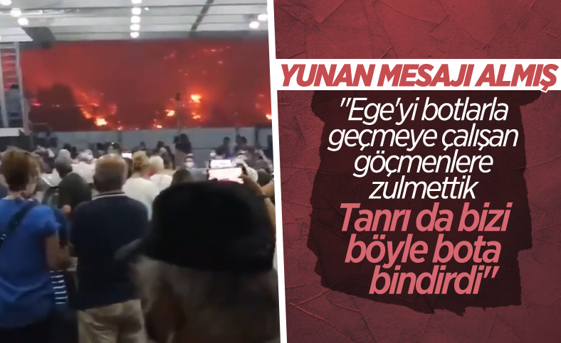 Yunanistan'da alevlerden feribotla kaçanların aklında göçmenler var