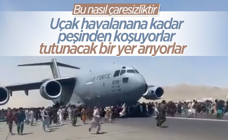 Kabil'de uçağa tutunmaya çalışan Afganlar görüntülendi