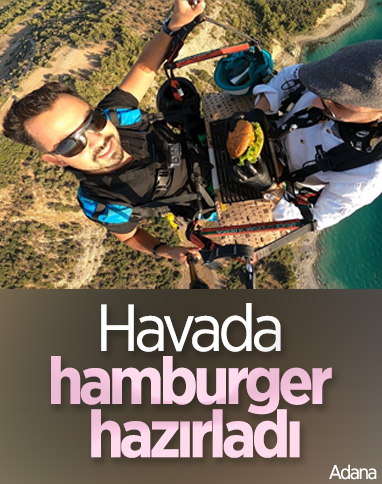 Adana'da aşçı, yamaç paraşütü yaparken hamburger hazırladı