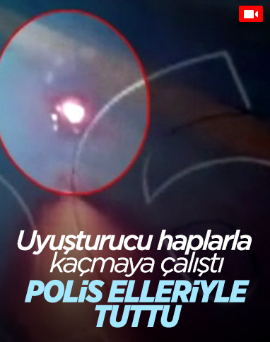 İzmir'de kaçmaya çalışan şüpheliyi polis elleriyle durdurdu