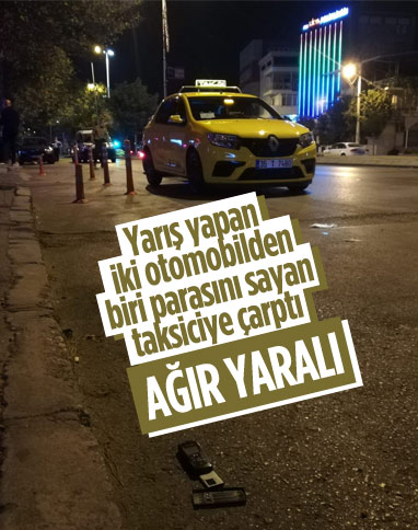 İzmir’de yarış yapan otomobilin çarptığı taksici ağır yaralandı