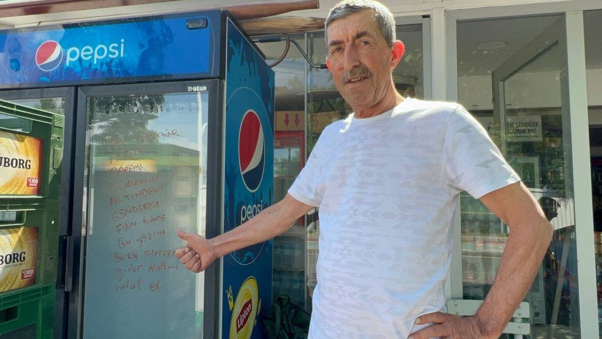 Bursa'da kapalı marketten kömür alınca parasını içeri attı