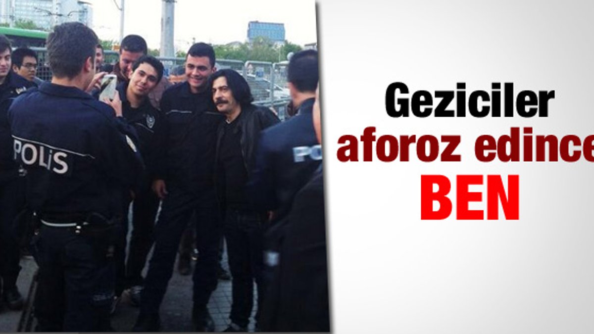 Okan Bayülgen Taksim'de polislerle poz verdi