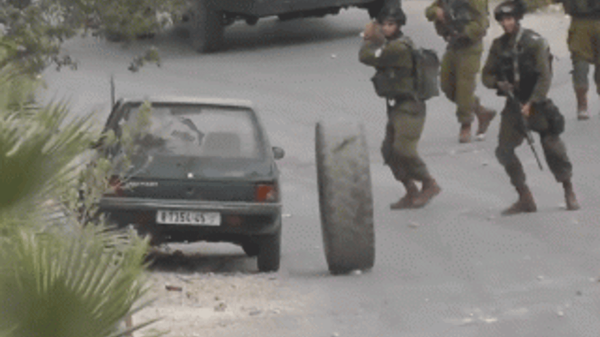 İsrail askerlerinin lastikle imtihanı İZLE