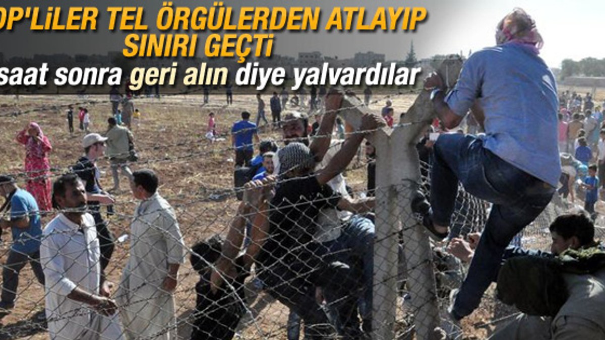 Yüzlerce kişi telleri yıkıp Kobani'ye geçti