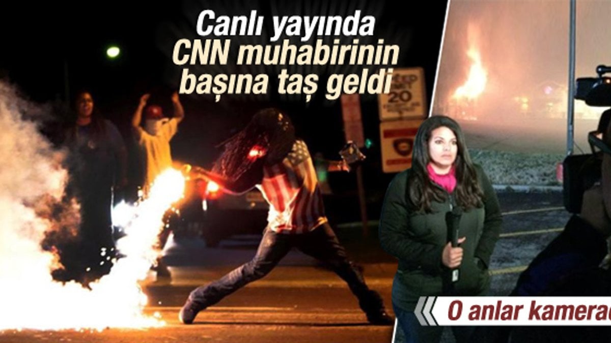 Ferguson'da CNN muhabirinin başına taş geldi