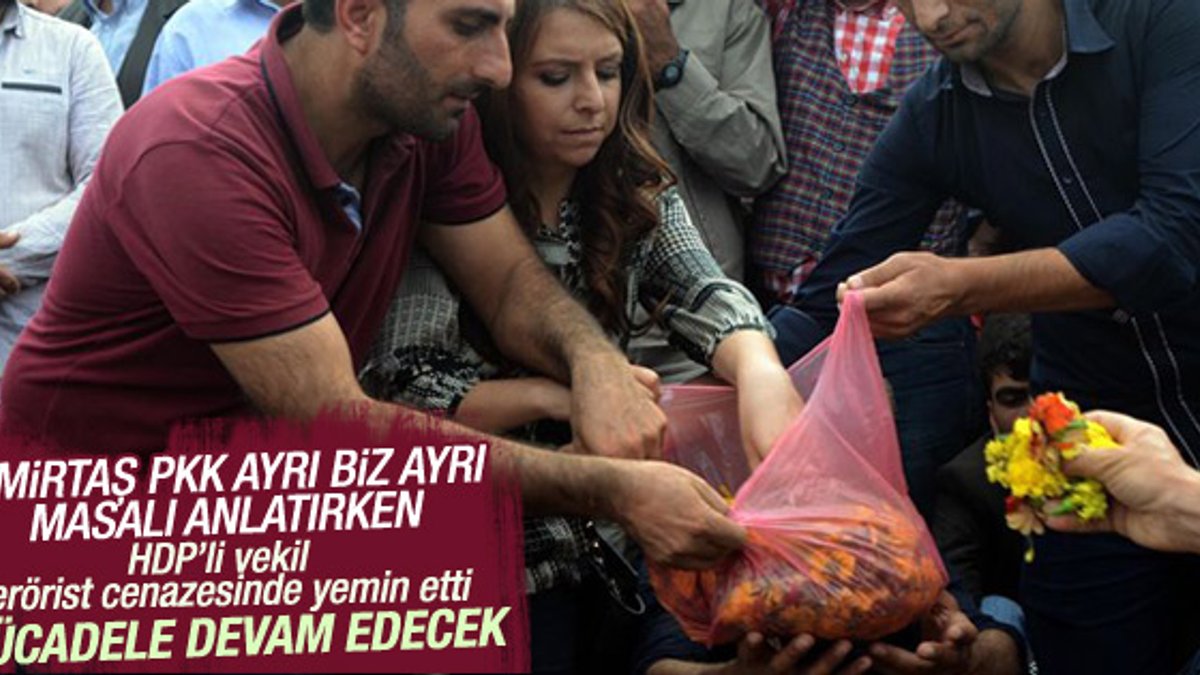 HDP'li vekil teröristin mezarına çiçek koydu