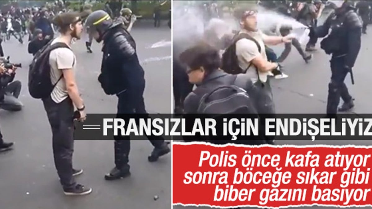 Fransız polisi göstericiye kafa attı