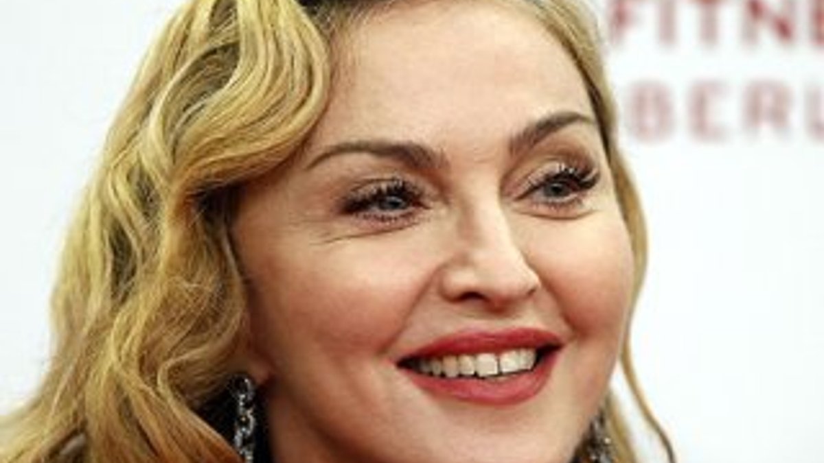 Madonna'nın evlatlığını açıklayan site tazminat ödedi