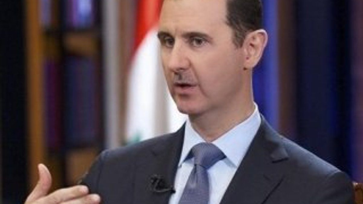 Macron'a 'Esad'ın şeref nişanını geri al' çağrısı