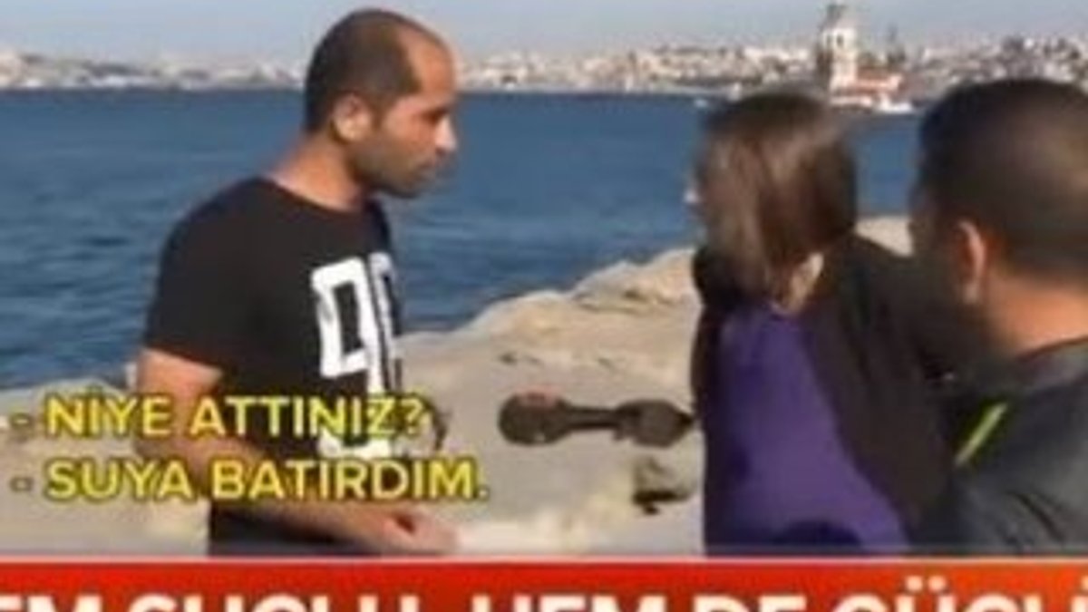 Yavru kediyi denize fırlatırken gazetecilere yakalandı